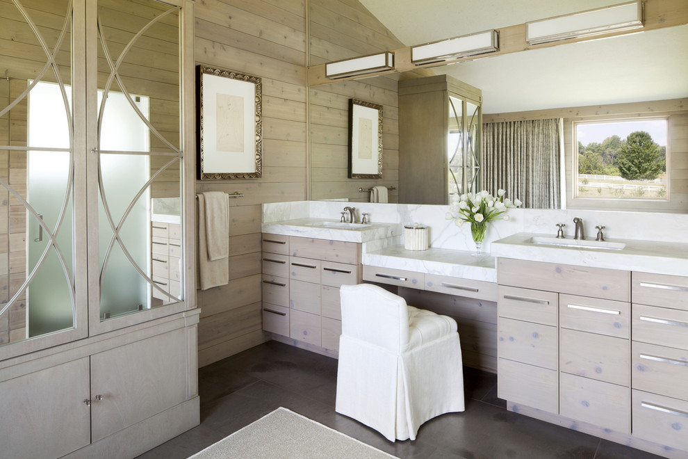 Photo of a country bathroom in DC Metro with an undermount sink, flat-panel cabinets and light wood cabinets.