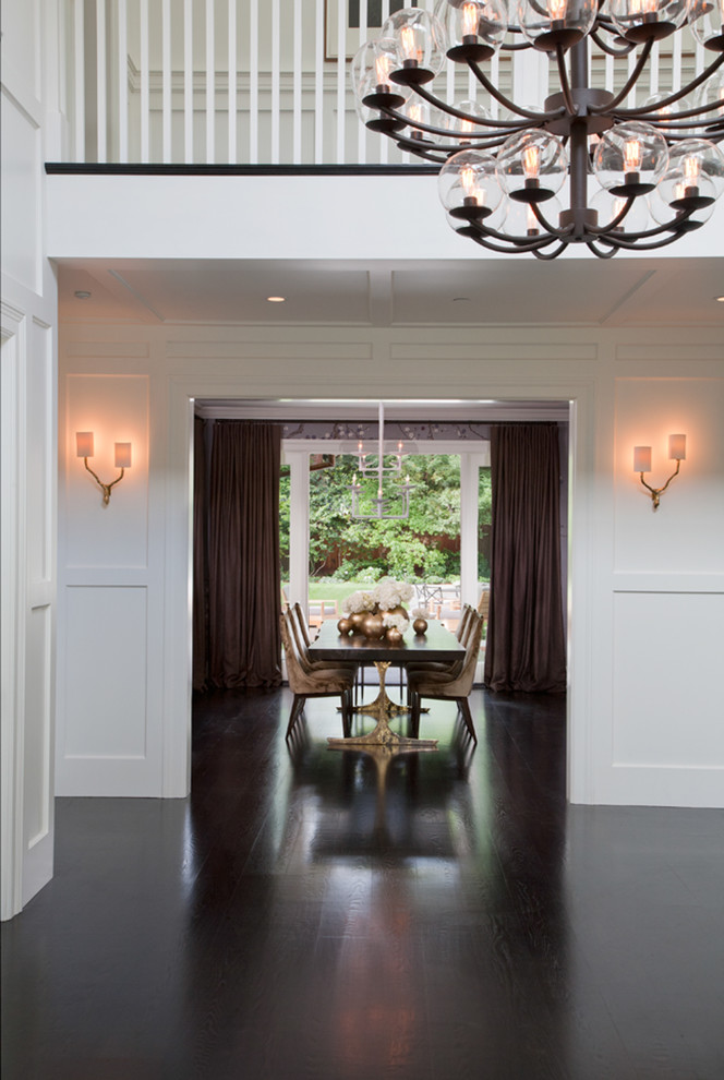 Design ideas for a large contemporary foyer in San Francisco with white walls and dark hardwood floors.
