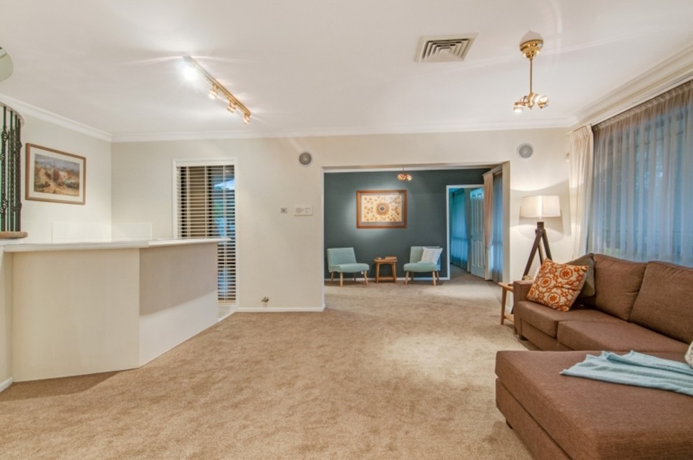 Design ideas for a mid-sized transitional open concept living room in Newcastle - Maitland with a home bar, carpet, no fireplace and beige floor.