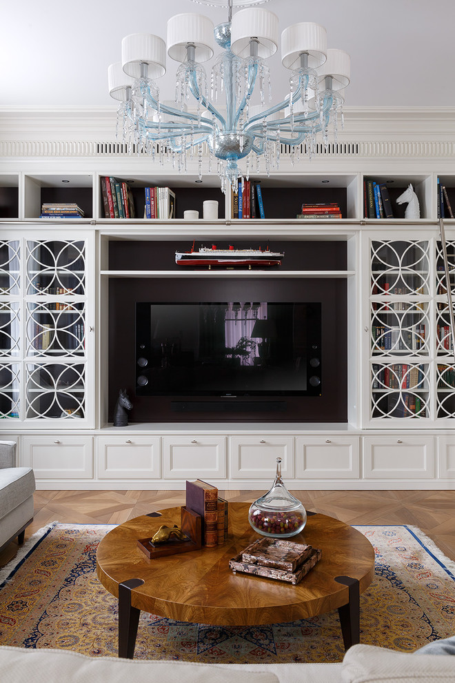 Mid-sized transitional open concept living room in Saint Petersburg with a library, white walls, medium hardwood floors, no fireplace, a built-in media wall and beige floor.