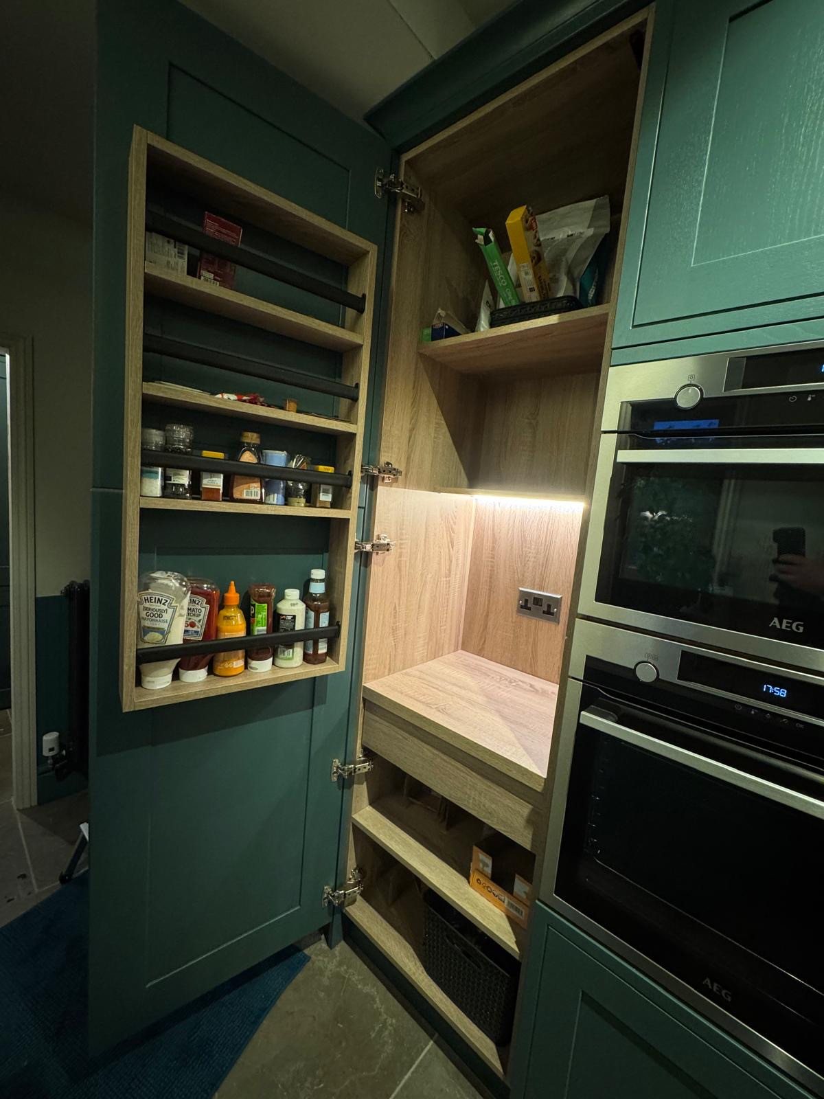 A Dark Coloured Gally Kitchen