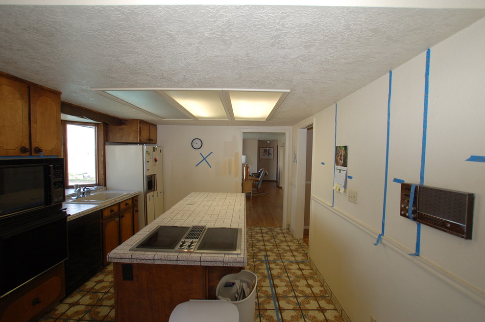Before kitchen was reconfigured and windows added