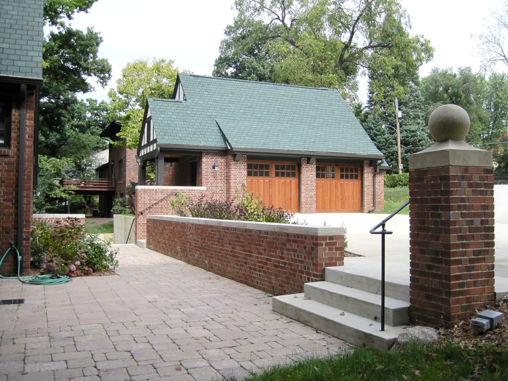 Inspiration for a mid-sized traditional detached two-car garage in Cedar Rapids.