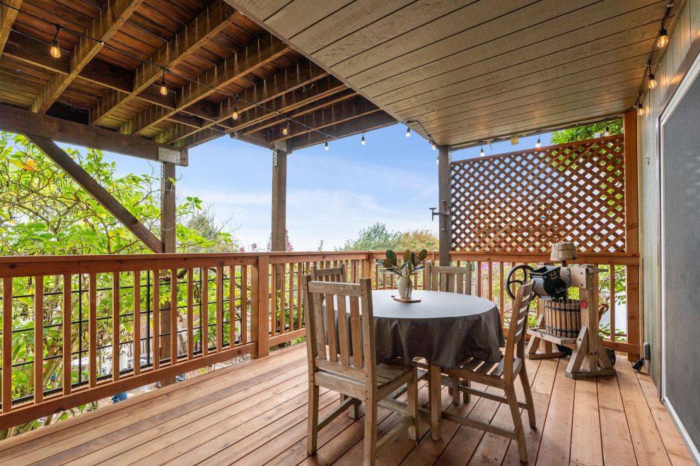 Deck - large rustic backyard second story wood railing deck idea in San Francisco with no cover