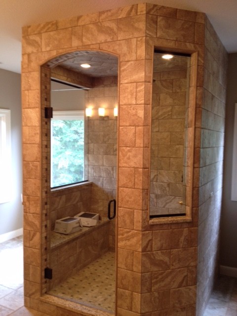 Large transitional master beige tile and ceramic tile ceramic tile alcove shower photo with beige walls and granite countertops