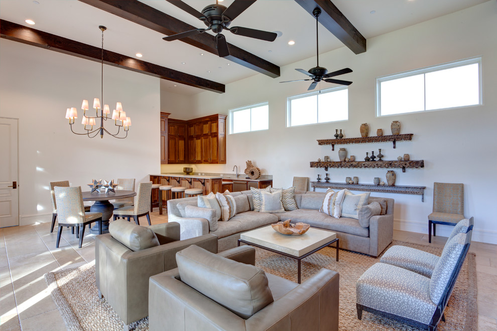 This is an example of a large mediterranean open concept family room in Dallas with a home bar, white walls, travertine floors, no fireplace and beige floor.