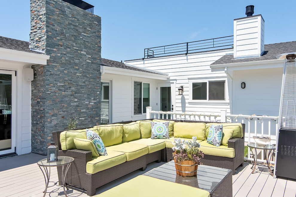 Design ideas for a large beach style deck in Orange County.