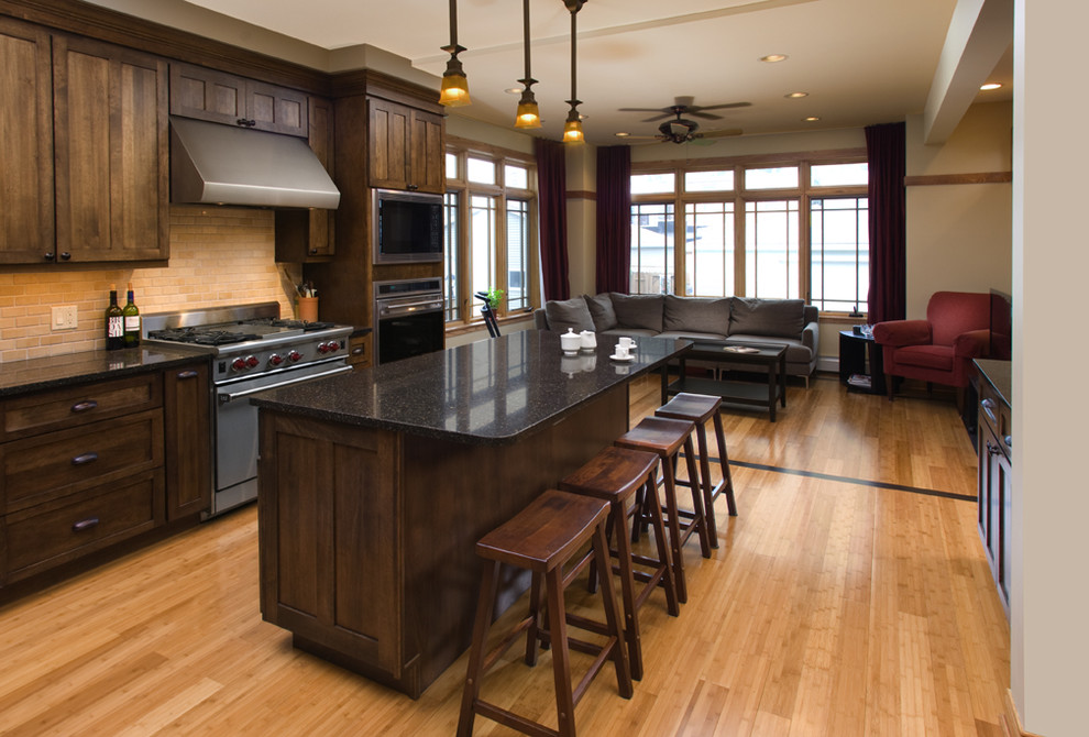 This is an example of a traditional kitchen in Chicago with granite benchtops.