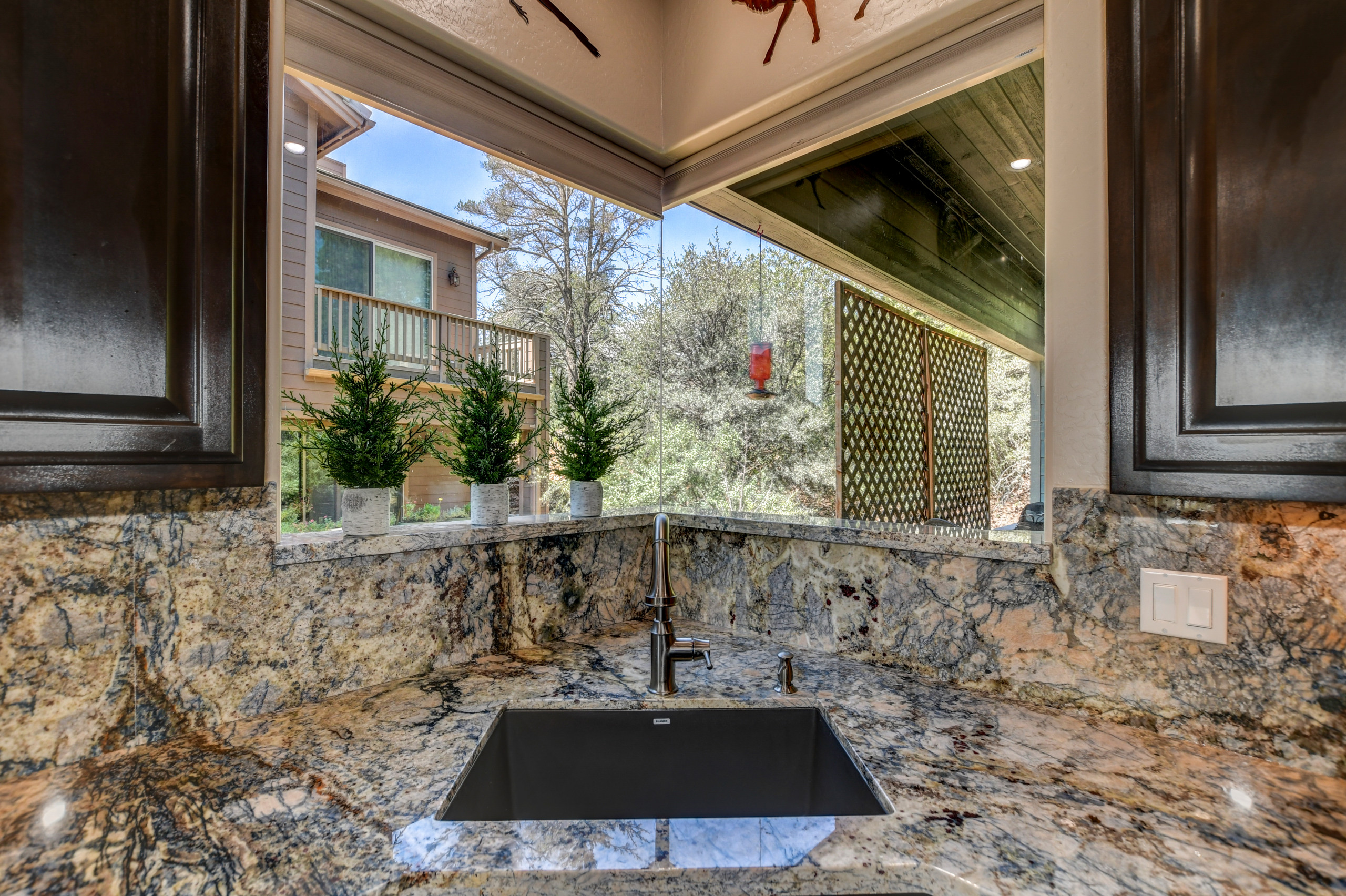 Azul Fantasy Granite with full height back splash