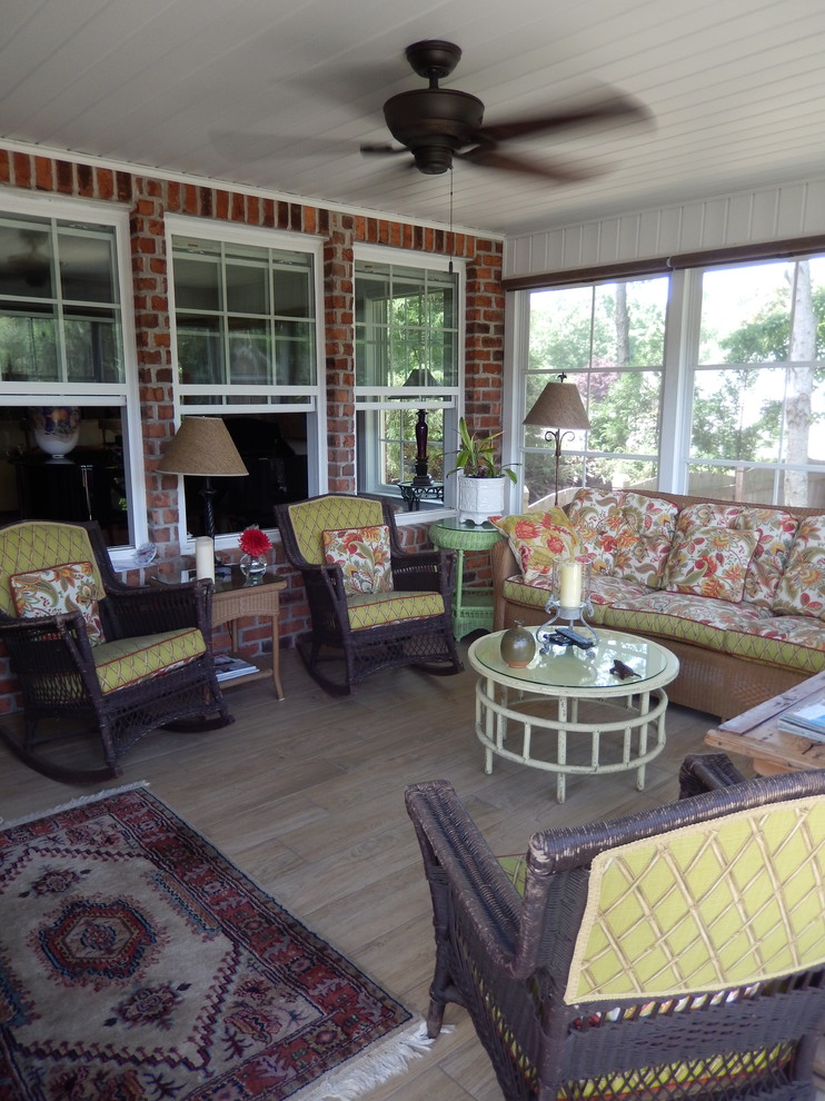 This is an example of a traditional sunroom in Other.