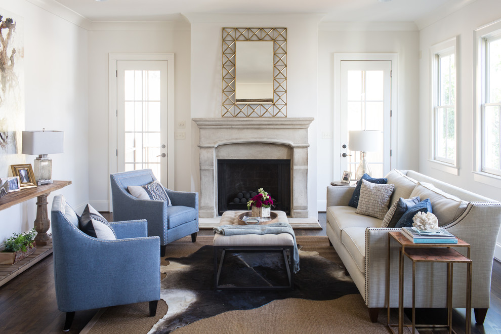 Inspiration for a mid-sized transitional formal living room in Birmingham with white walls, dark hardwood floors and a standard fireplace.