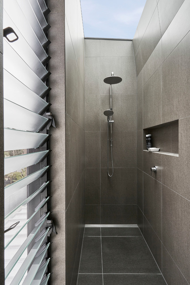 Mid-sized modern master bathroom in Melbourne with an alcove shower, gray tile, ceramic tile, grey walls and ceramic floors.