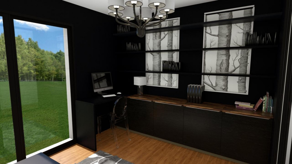 Ejemplo de despacho clásico renovado pequeño sin chimenea con paredes negras, suelo de madera clara, escritorio empotrado y suelo marrón