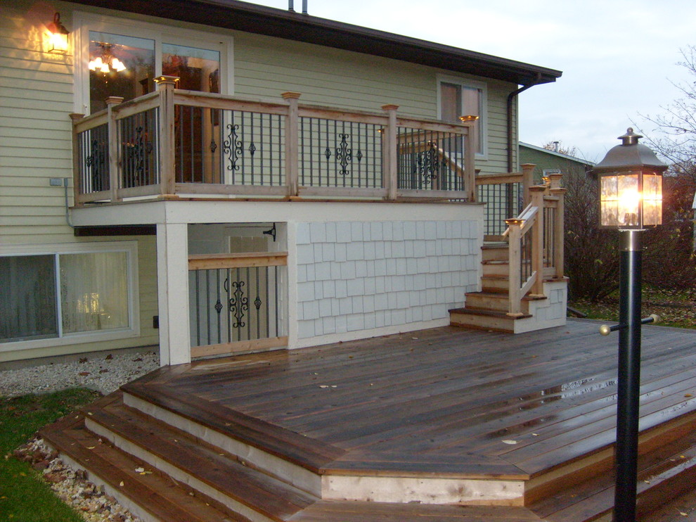 Deck - mid-sized coastal backyard deck idea in Milwaukee with no cover