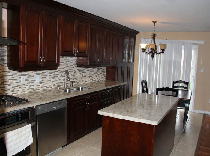 Dark Cherry Coloured Custom Kitchen Cabinets With Granite