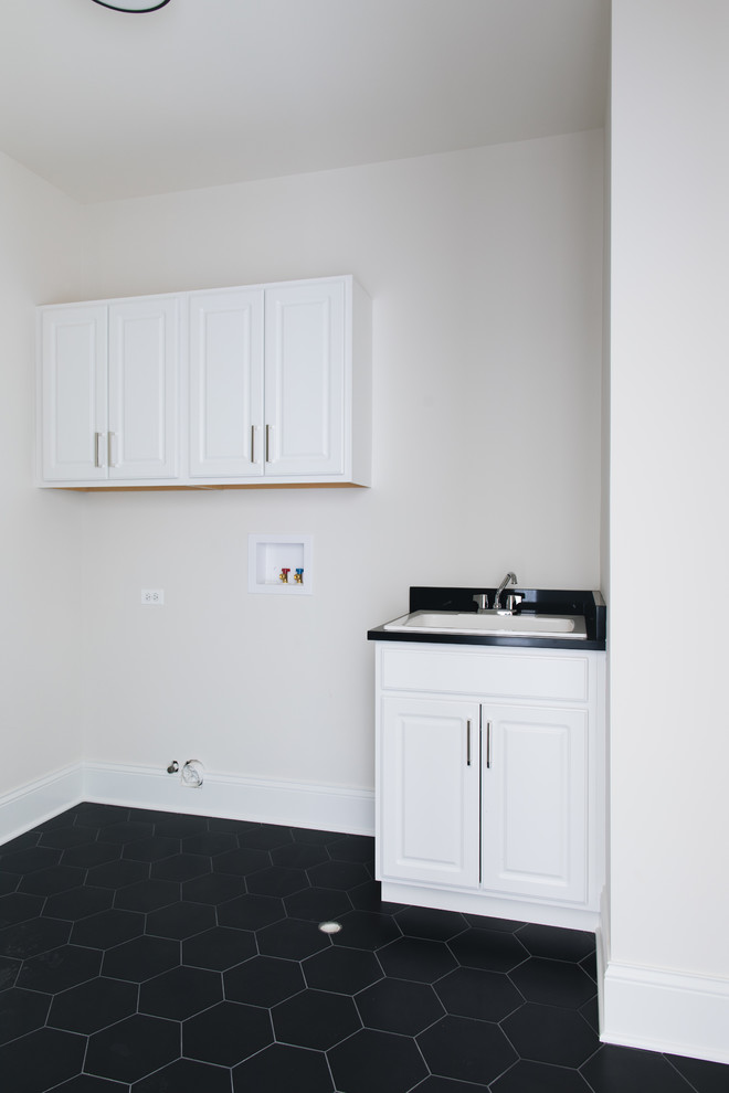 Transitional laundry room photo in Chicago