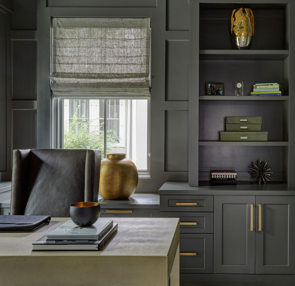 Inspiration for a mid-sized transitional study room in Chicago with grey walls, medium hardwood floors, no fireplace, a freestanding desk and brown floor.