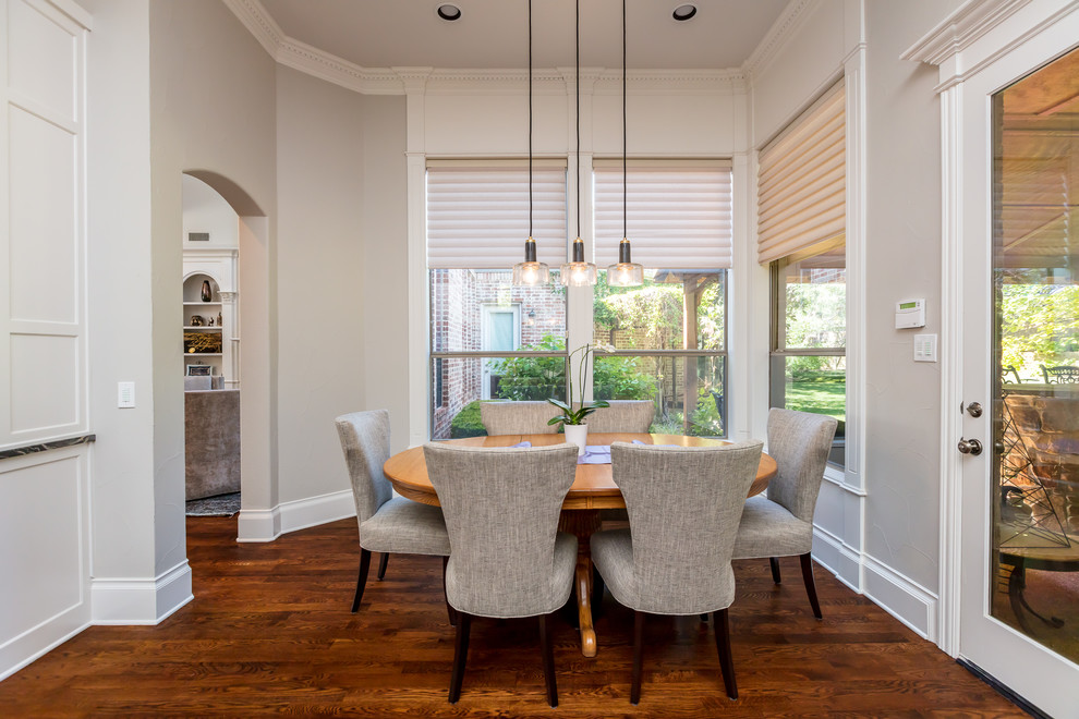 Inspiration for a large transitional kitchen/dining combo in Dallas with dark hardwood floors and brown floor.