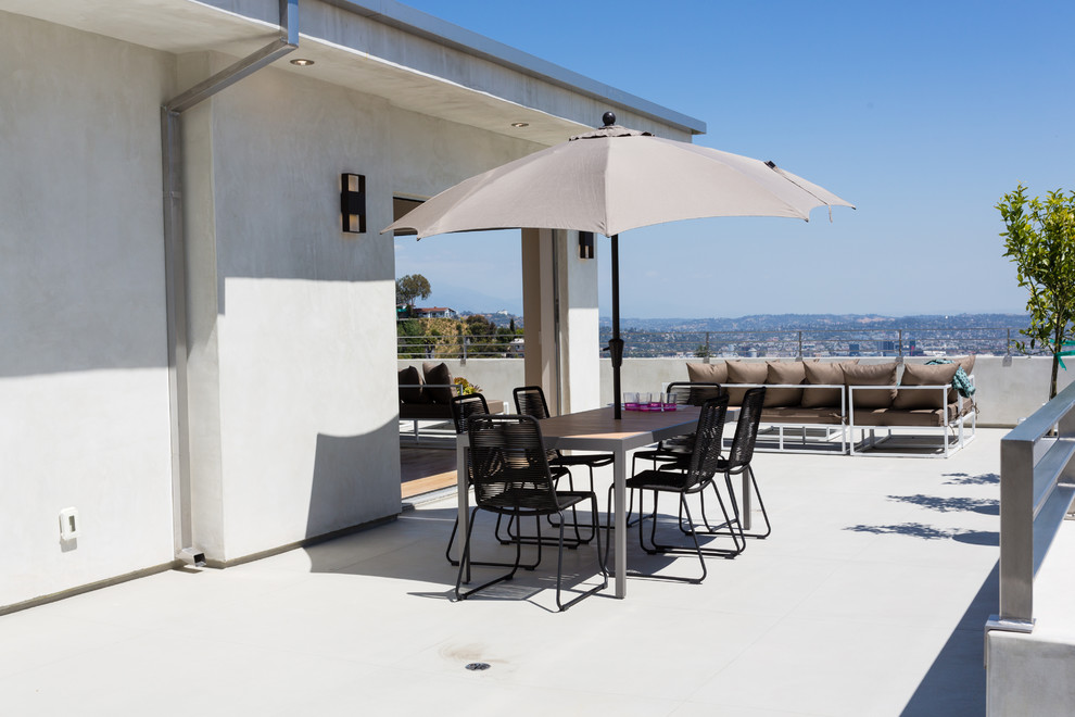 Inspiration for a large contemporary rooftop deck in Other with no cover.