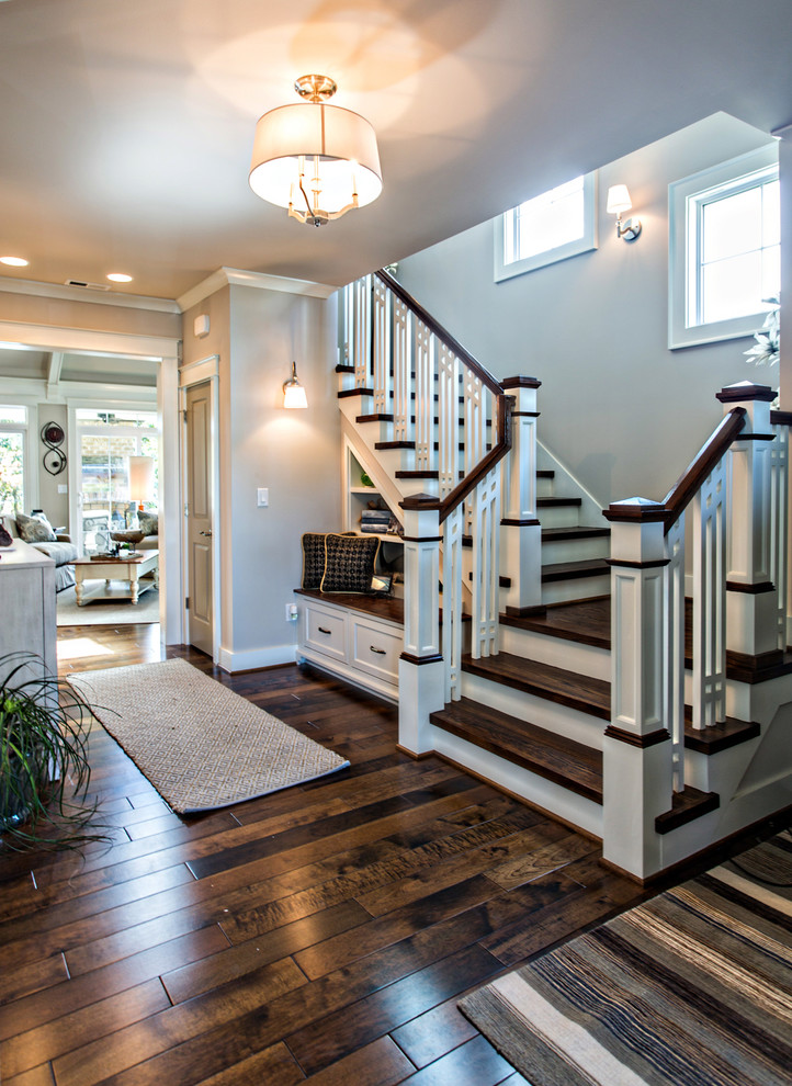 Photo of a mid-sized arts and crafts foyer in Richmond with grey walls and dark hardwood floors.