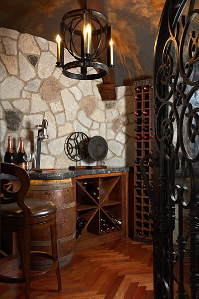 This is an example of a mediterranean wine cellar in Minneapolis.