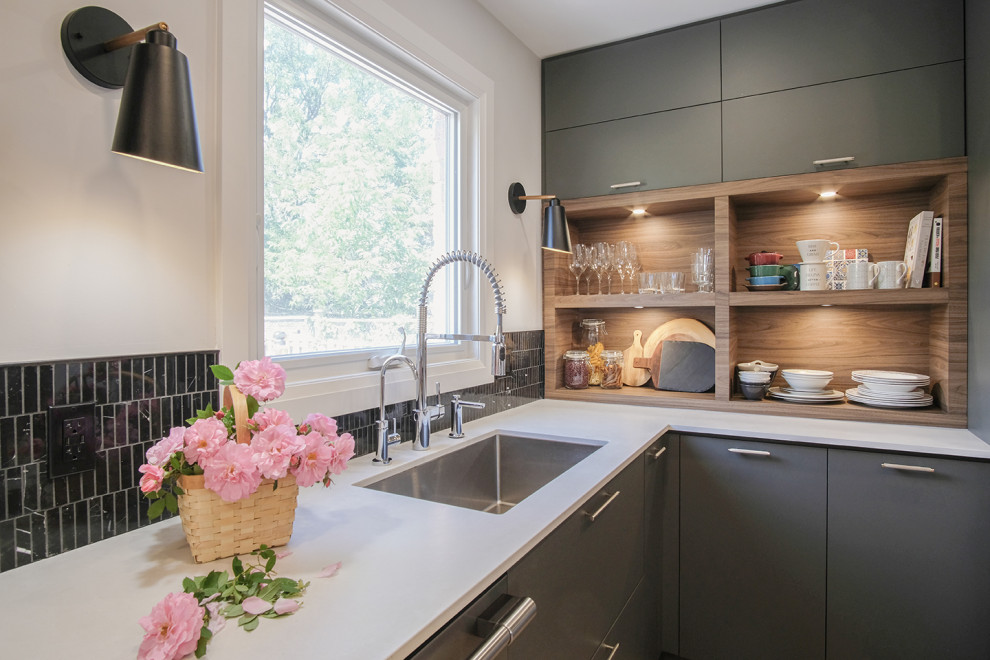 Photo of a small modern l-shaped kitchen in Toronto with a single-bowl sink, flat-panel cabinets, grey cabinets, quartz worktops, black splashback, marble splashback, stainless steel appliances, vinyl flooring, beige floors and yellow worktops.