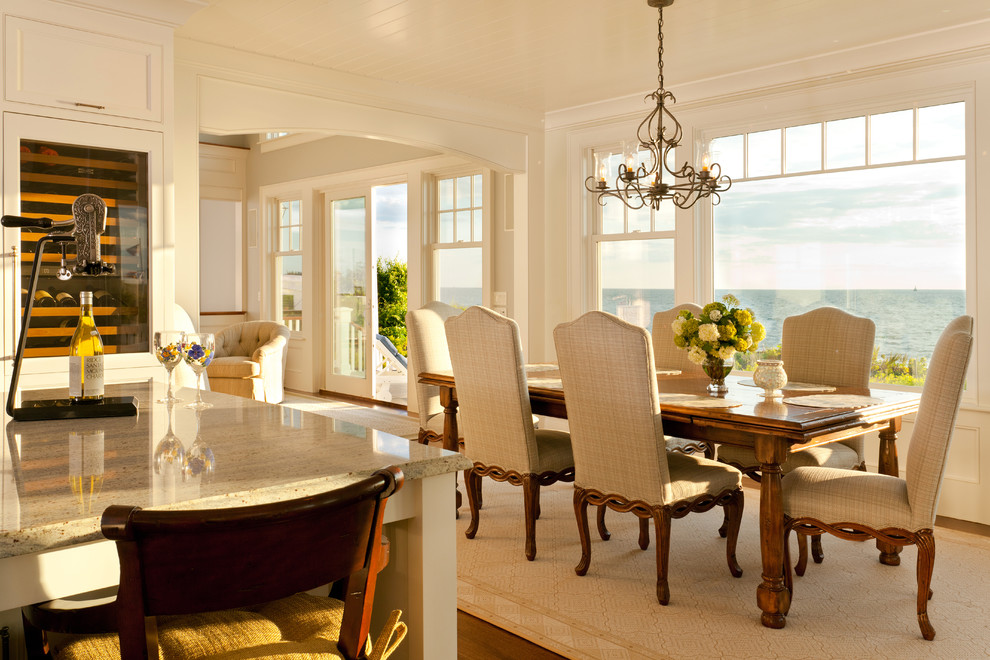 Photo of a large beach style kitchen/dining combo in Boston with grey walls and dark hardwood floors.