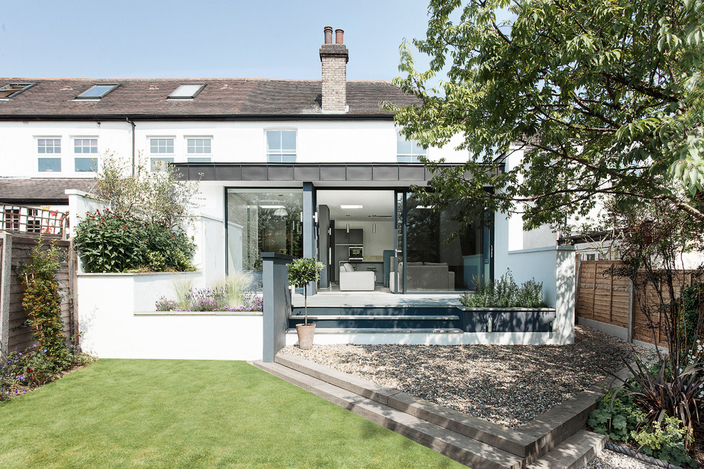 Inspiration for a contemporary two-storey white exterior in Hampshire.