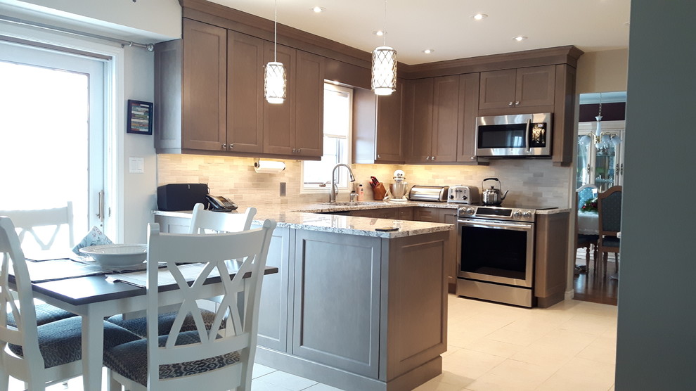 Mid-sized transitional u-shaped eat-in kitchen photo in Toronto with shaker cabinets, gray cabinets, granite countertops, a peninsula, an undermount sink, gray backsplash and stainless steel appliances