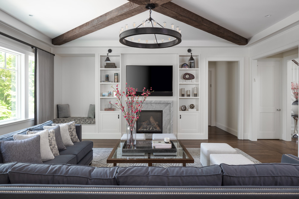 Transitional dark wood floor family room photo in New York with white walls, a standard fireplace, a stone fireplace and a wall-mounted tv