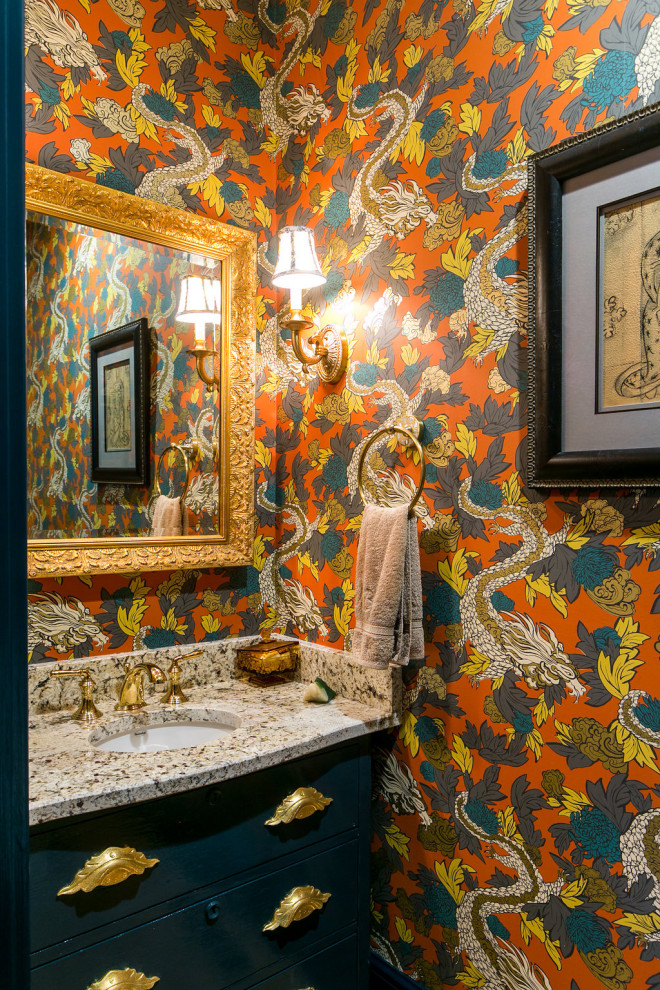 Small traditional powder room in Richmond with furniture-like cabinets, black cabinets, medium hardwood floors, an undermount sink, granite benchtops, brown floor, beige benchtops, a freestanding vanity and wallpaper.