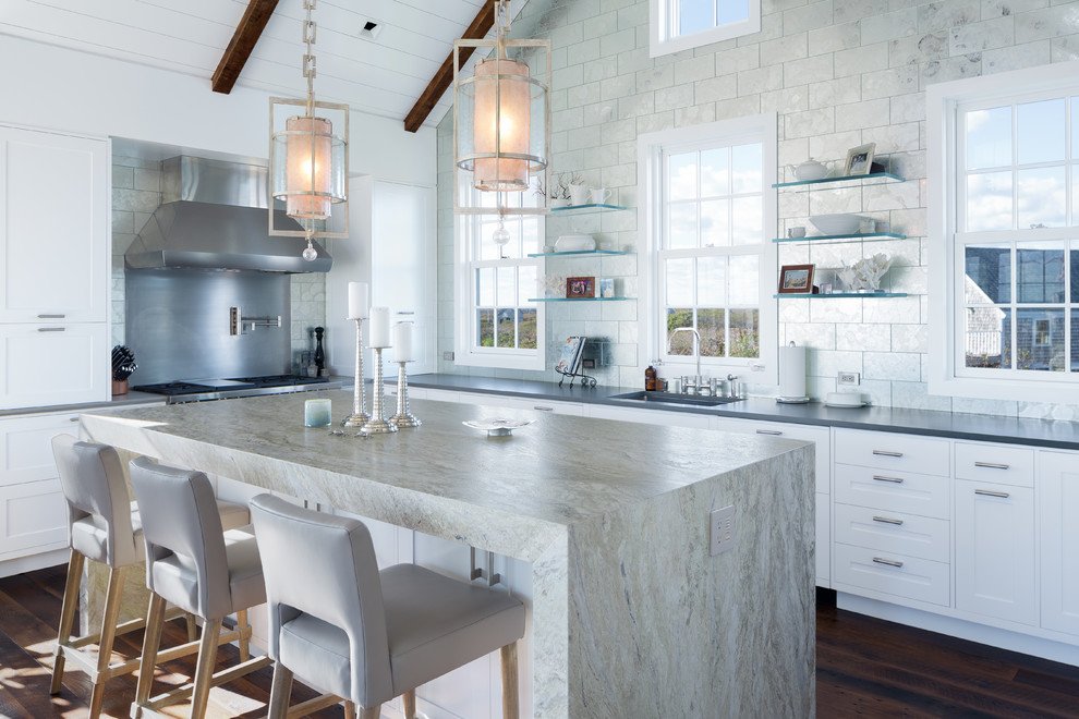 Inspiration for a beach style l-shaped kitchen in Boston with a single-bowl sink, shaker cabinets, white cabinets, metallic splashback, metal splashback, dark hardwood floors and with island.