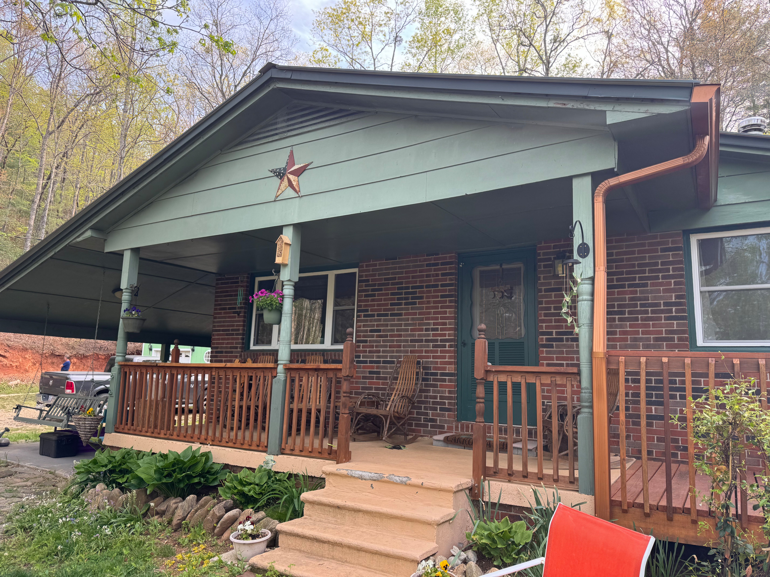Screened Porch Addition with Cedar Accents and Gable Detail