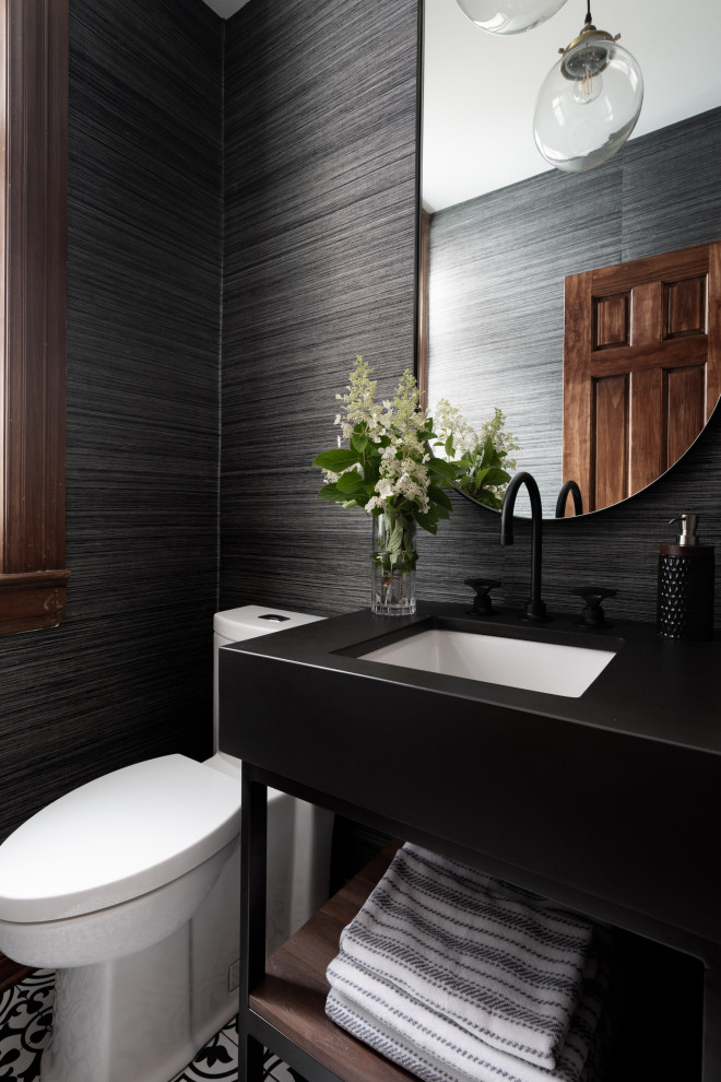 This is an example of a contemporary shower room bathroom in Montreal with open cabinets, black cabinets, a one-piece toilet, blue walls, mosaic tile flooring, an integrated sink, concrete worktops, black floors, black worktops, a single sink, a freestanding vanity unit and wallpapered walls.