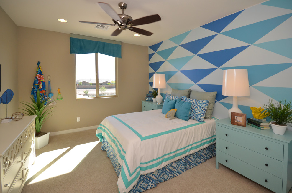 Mid-sized modern gender-neutral kids' bedroom in Phoenix with multi-coloured walls and carpet for kids 4-10 years old.