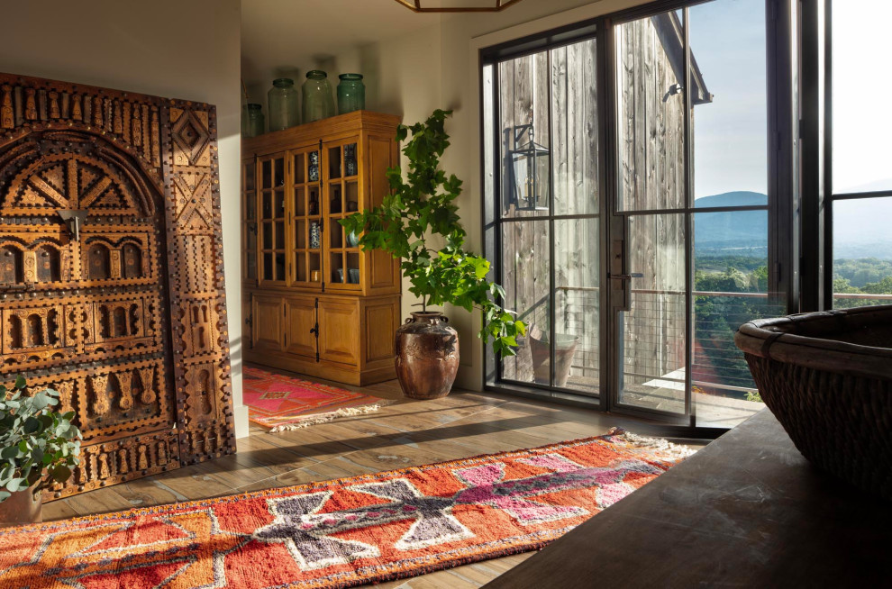 Inspiration for a huge transitional porcelain tile and brown floor front door remodel in Richmond with beige walls and a black front door