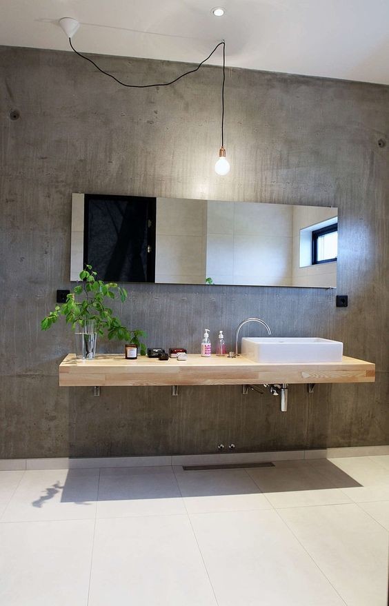 This is an example of an industrial bathroom in Other.
