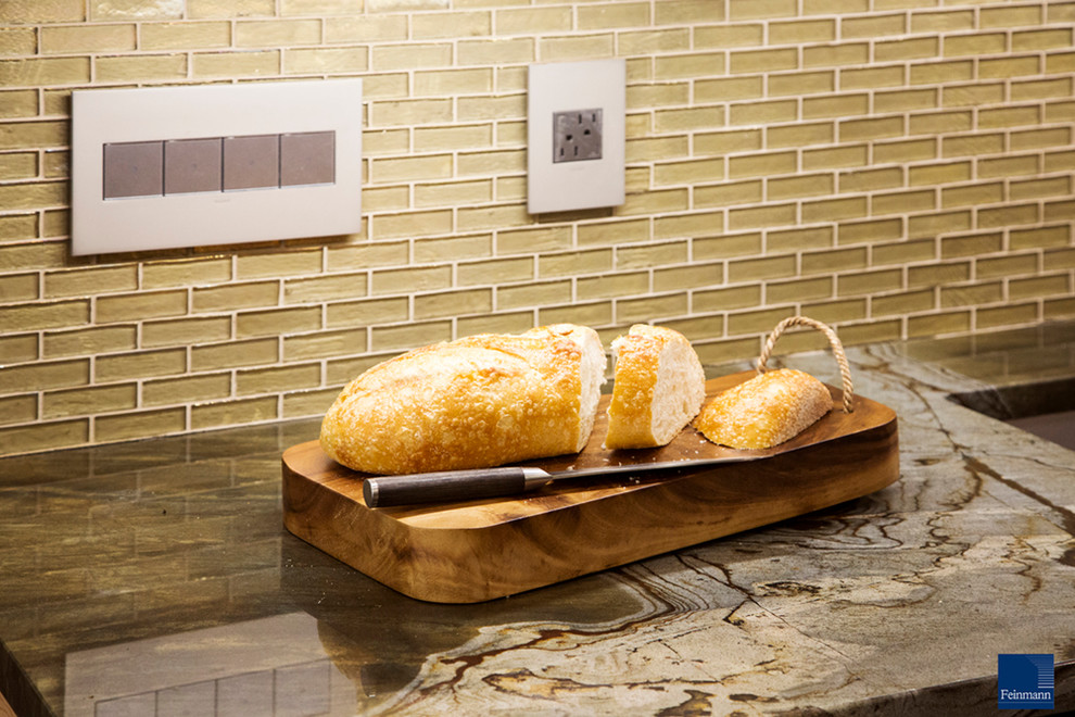 Example of a mid-sized transitional medium tone wood floor kitchen design in Boston with an island