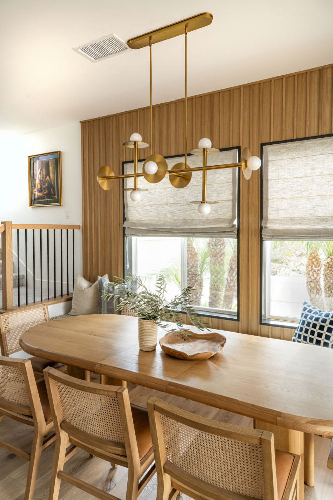 Example of a transitional dining room design in Los Angeles