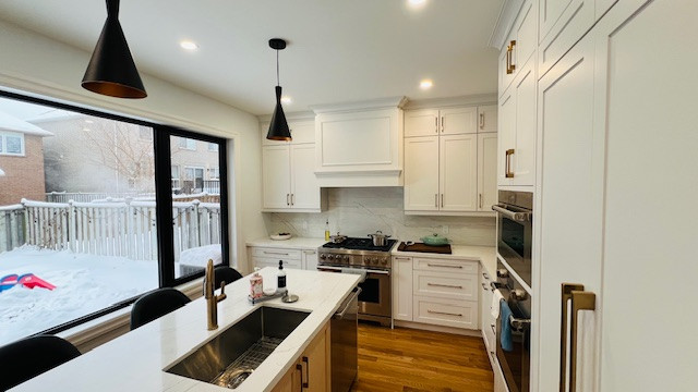 Main Floor with large window & patio door include an open concept kitchen