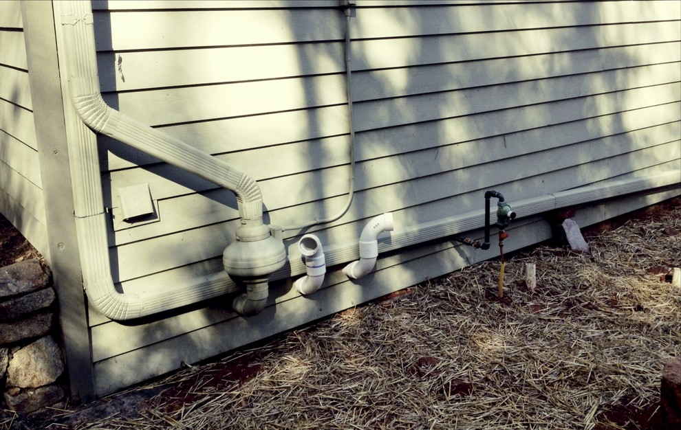 Need ideas to disguise vent pipes, gas regulator and radon pump