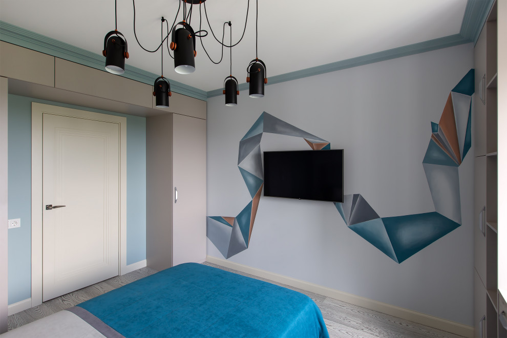 Réalisation d'une chambre d'enfant design de taille moyenne avec un bureau, un mur bleu, un sol en liège, un sol gris, un plafond décaissé et boiseries.