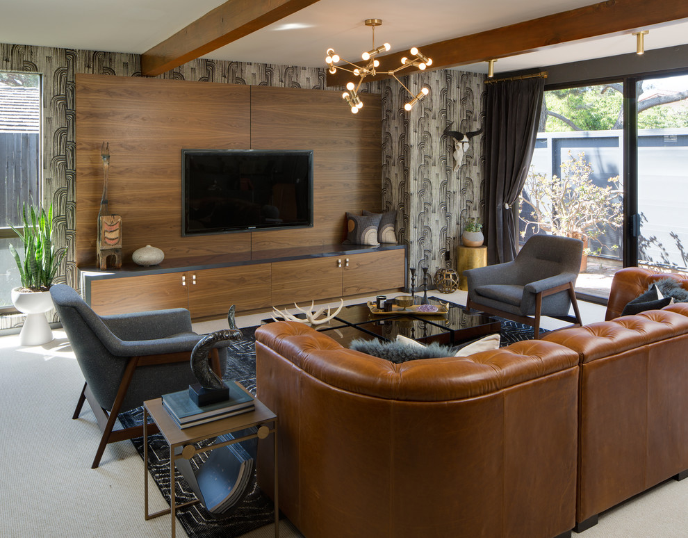 Midcentury family room in San Diego with brown walls, carpet, a wall-mounted tv and white floor.
