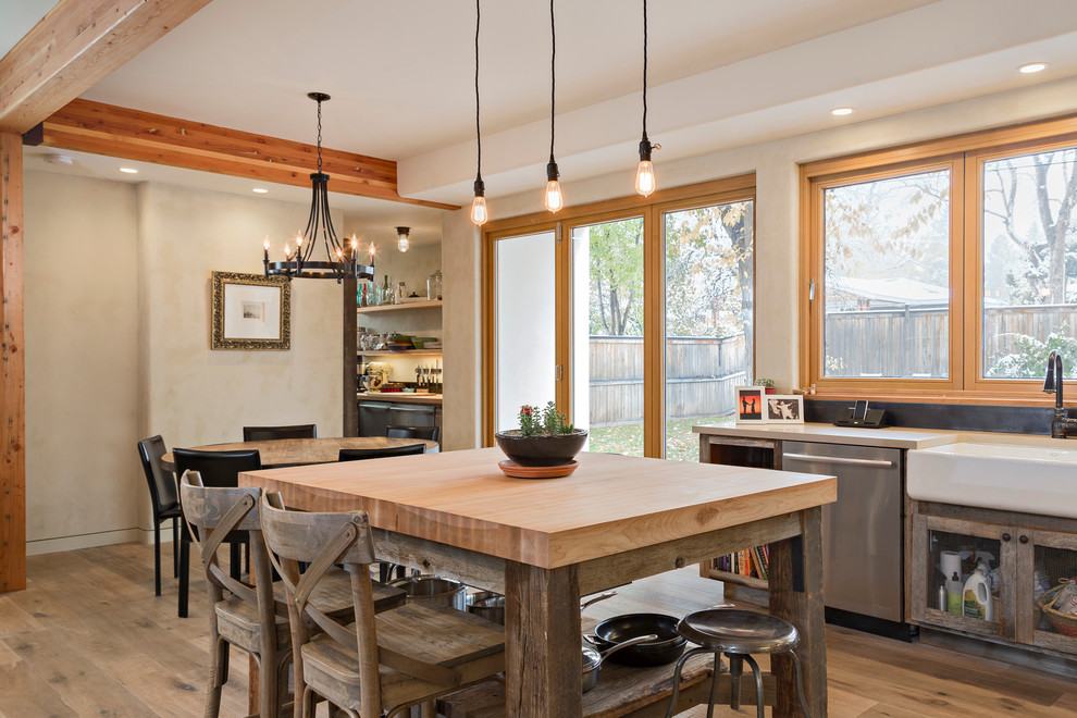 Inspiration for a mid-sized rustic u-shaped light wood floor and beige floor eat-in kitchen remodel in Denver with a farmhouse sink, open cabinets, distressed cabinets, quartz countertops, metallic backsplash, stainless steel appliances, an island and gray countertops