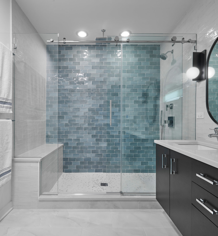 Photo of a mid-sized transitional master wet room bathroom in Chicago with shaker cabinets, dark wood cabinets, white tile, porcelain tile, blue walls, porcelain floors, quartzite benchtops, white floor, a sliding shower screen, white benchtops, a shower seat, a double vanity and a floating vanity.