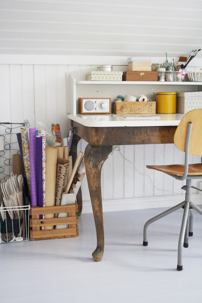 Inspiration for a traditional home office in Other with white walls and a freestanding desk.
