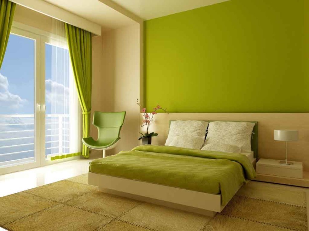 Photo of a large asian bedroom in Other with green walls.