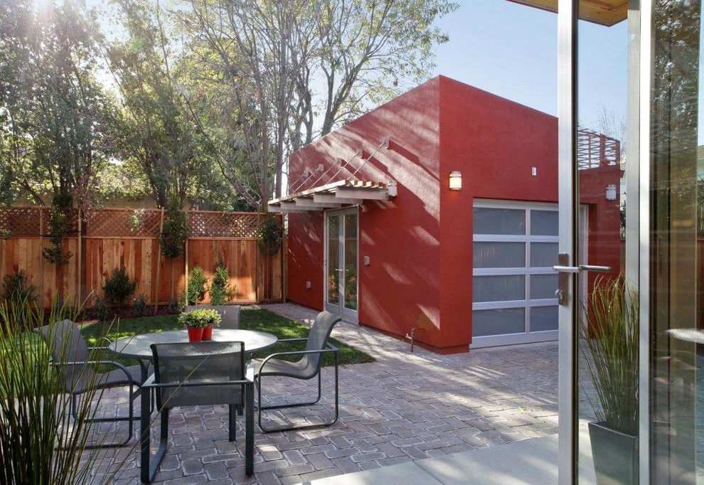 This is an example of a contemporary patio in San Francisco with concrete pavers and no cover.