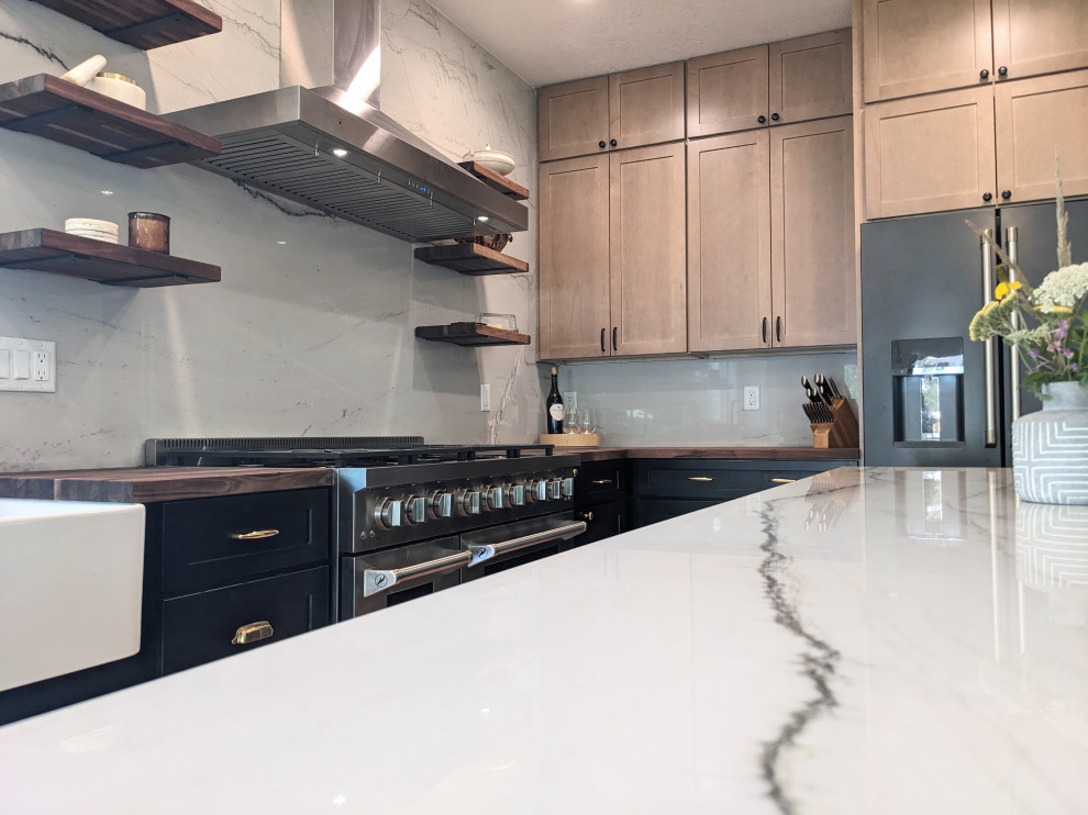Example of a transitional kitchen design in Denver