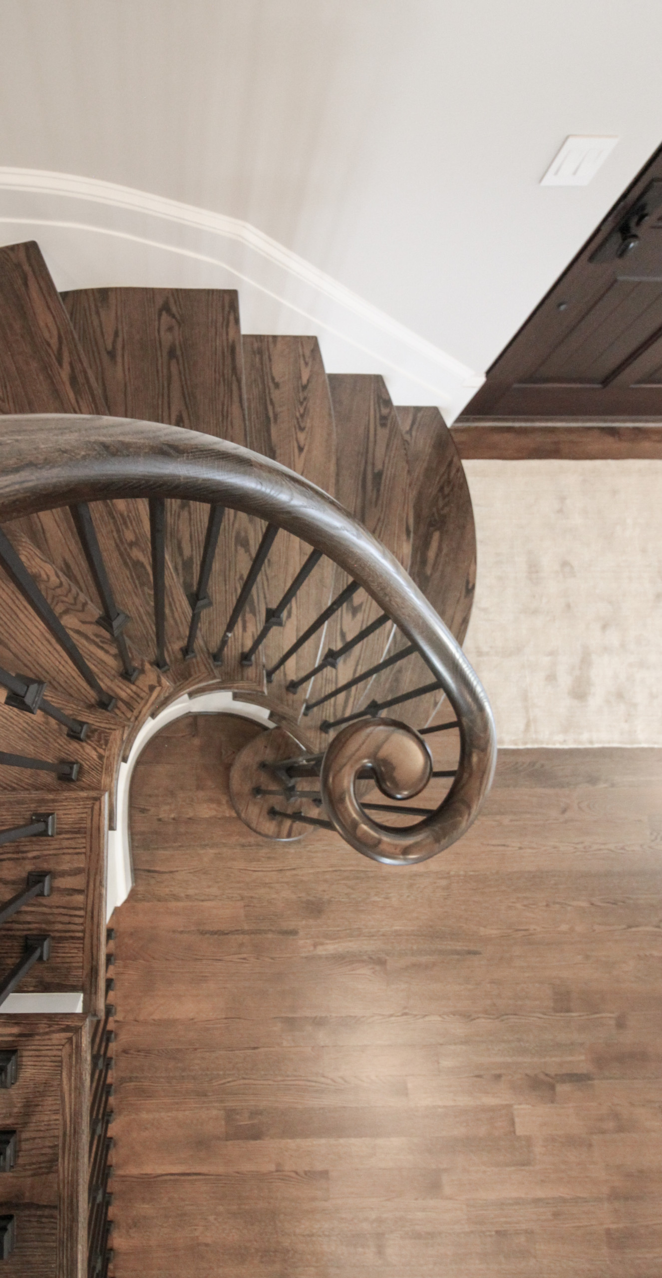 Project #86 | Sweeping Curved Staircase with Iron Balusters